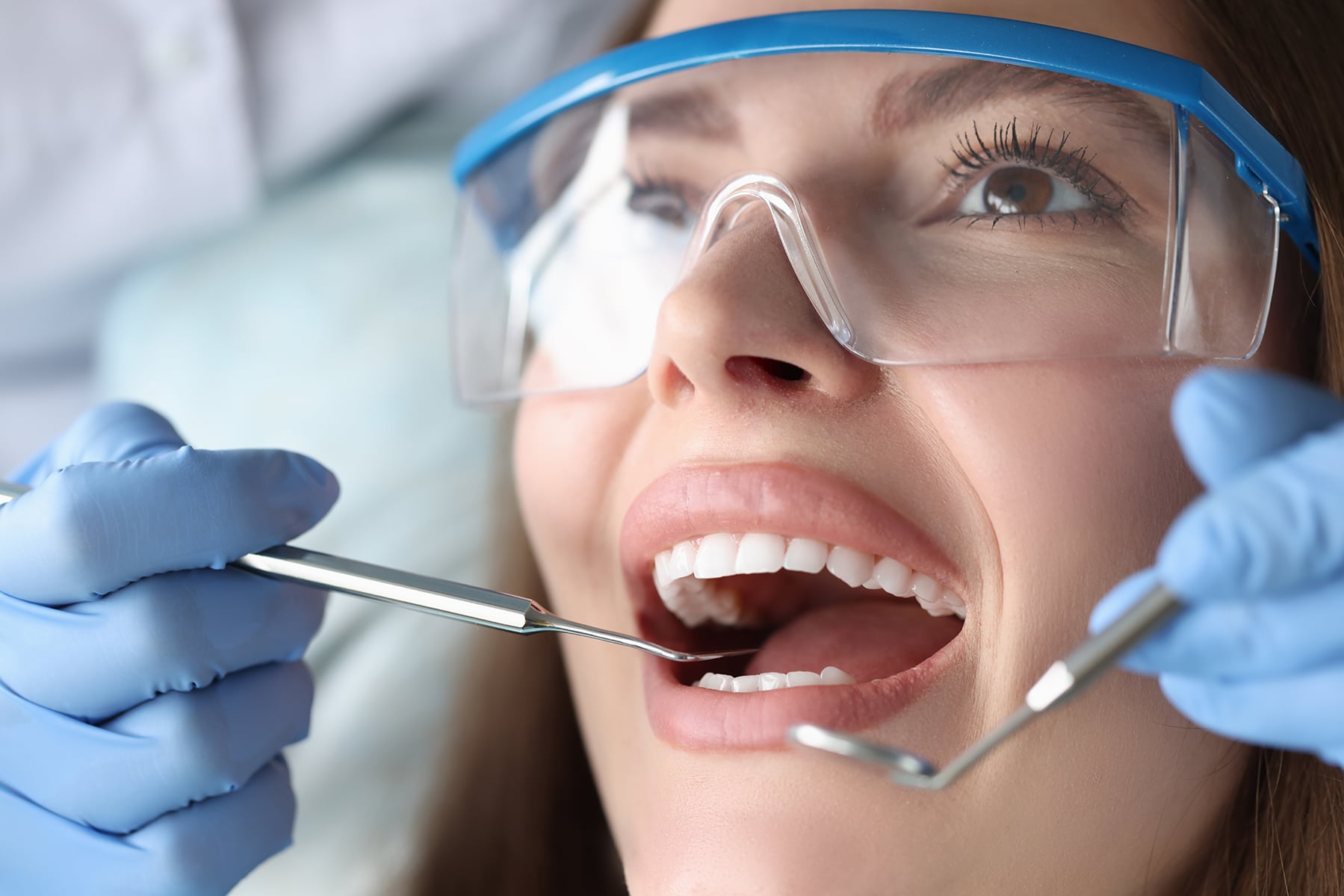 Woman at a dental cleaning in Falls Church, VA