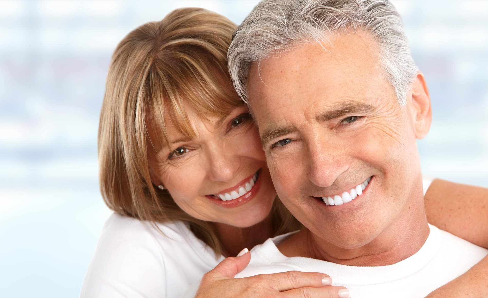 Man and Woman happy with teeth whitening in Falls Church VA