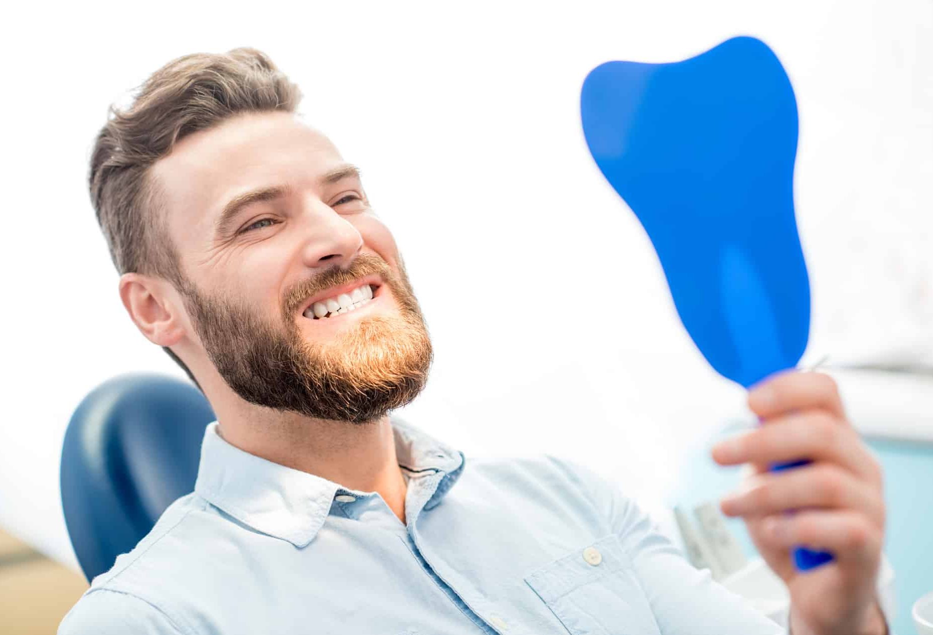 Patient happy with his smile makeover treatment at Everlasting Dental Care in Falls Church VA