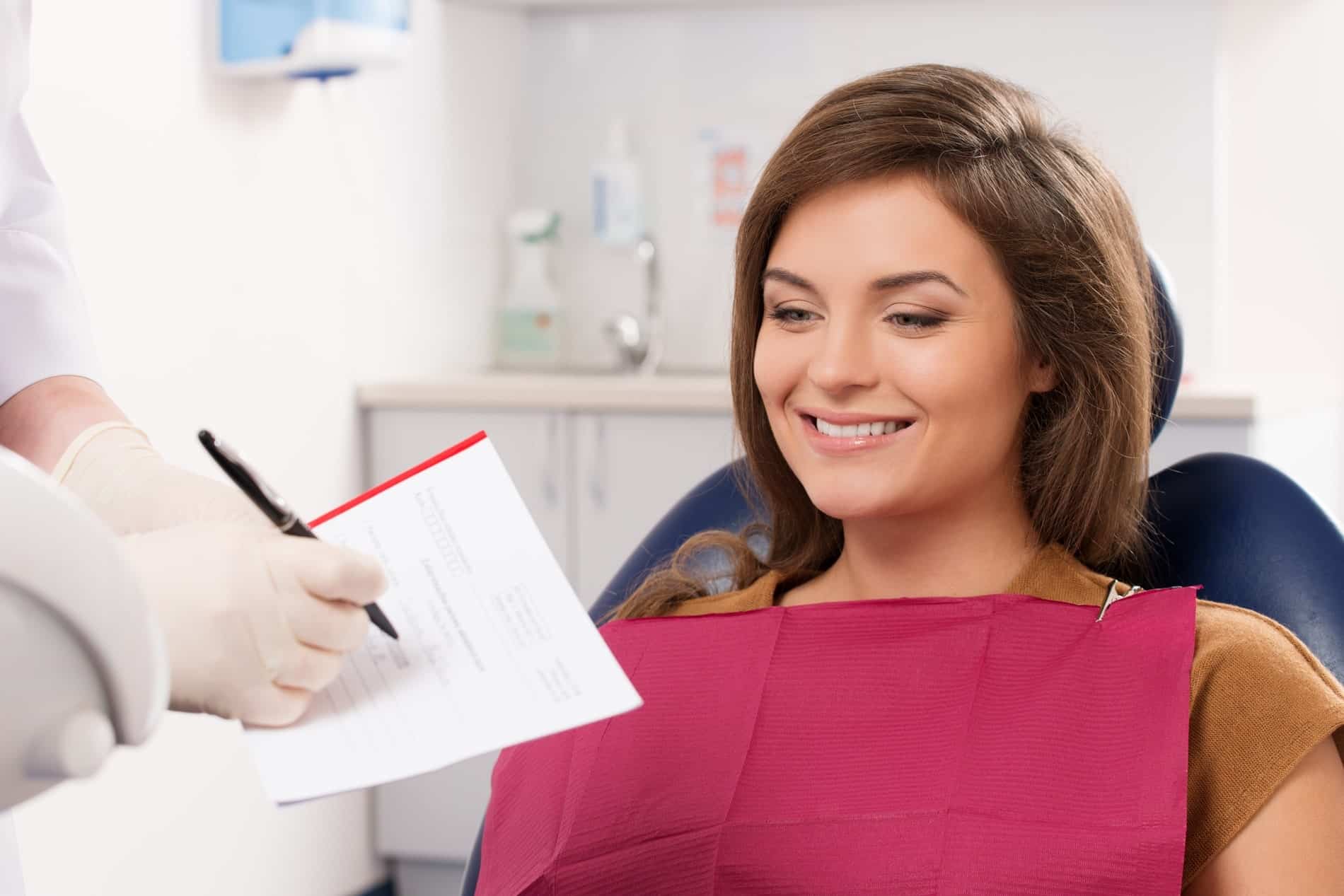 RootCanal1_AdobeStock_58219712_1900x1267-min patient satisfied with her root canal therapy from Everlasting Dental Care in Falls Church VA